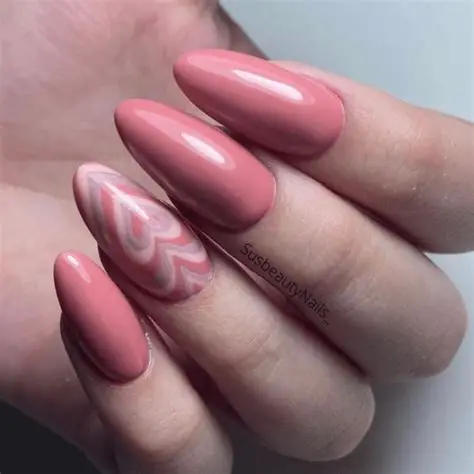 Glossy Pink Almond Nails with Marble Accent Design